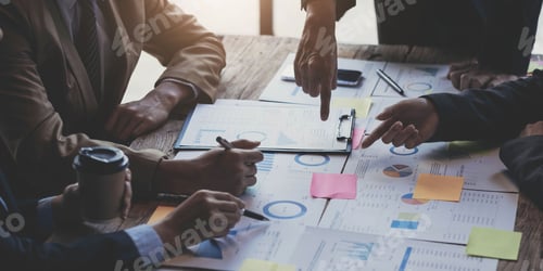 Preview: Business team support and meeting concept. Group of Investor working and pointing at financial