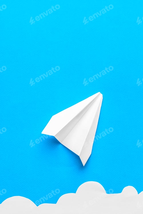 Preview: Flying paper plane in the clouds on a blue background. Concept of flight, travel, transfer