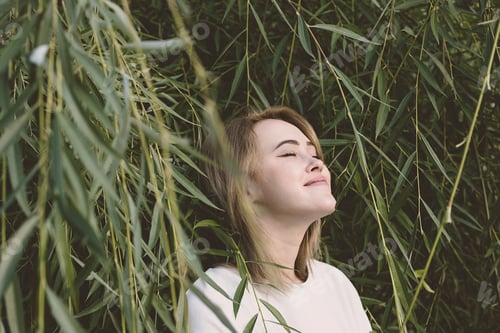 Preview: Female Portrait in Woodland on Sunny Day, Toned Image.