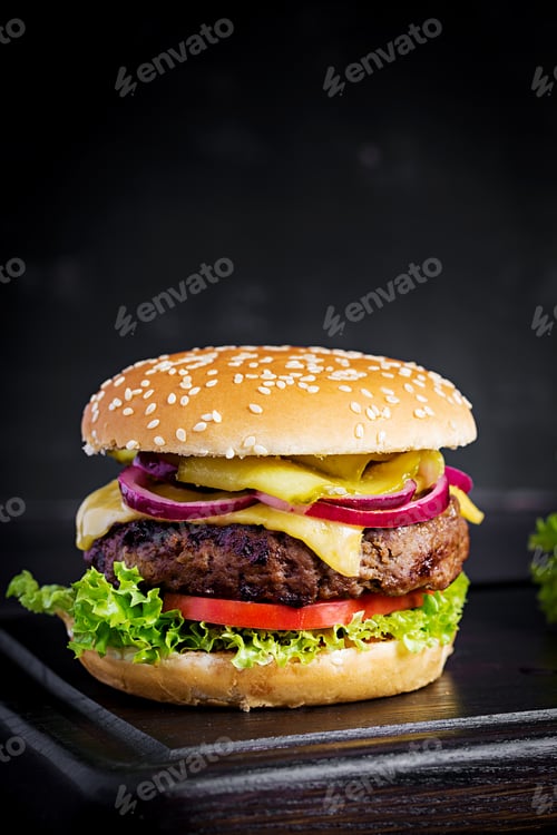 Preview: Big sandwich - hamburger burger with beef, tomato, cheese, pickled cucumber and red onion.