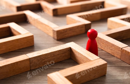 Preview: concept photo of standing in a maze and looking for the best way