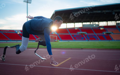 Preview: Disabled athletes prepare in starting position ready to run on stadium track