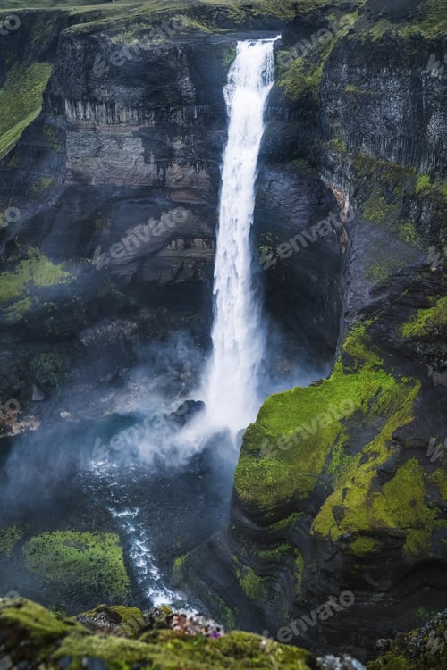 Preview: Dramatic close up of Haifoss Waterfall in Landmannalaugar canyon, Iceland