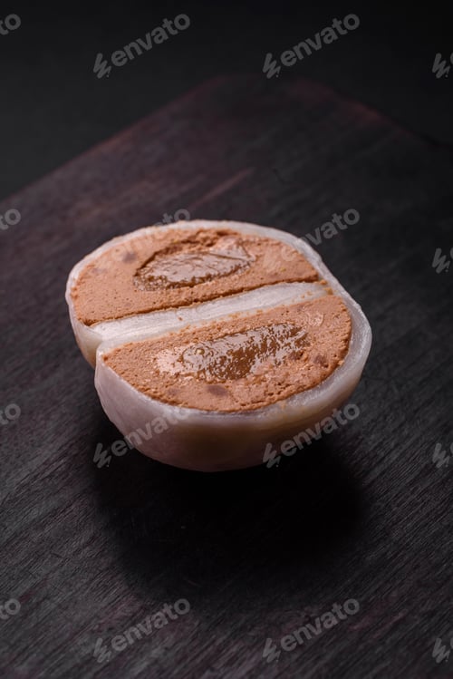 Preview: Delicious sweet mochi dessert with toppings on a dark concrete background