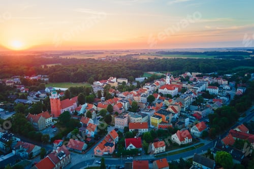 Preview: Suburban landscape with small town at sunrise