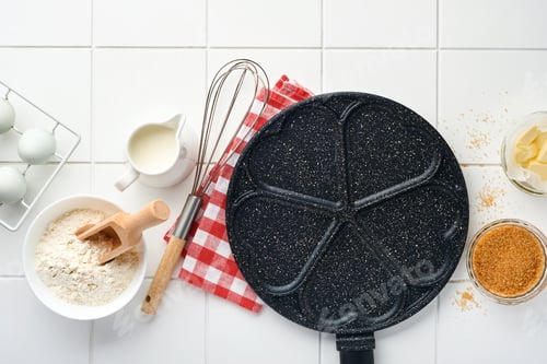Preview: Empty frying pan black, skillet with stone nonstick coating for baking pancakes in shape of breakfas