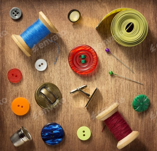 Preview: sewing tools on wooden background