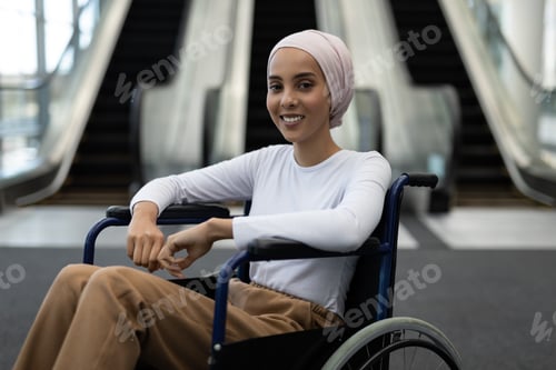 Preview: Portrait of young disabled mixed-race female executive in the lobby at office