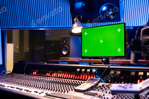 Preview: Empty professional studio control room with greenscreen pc