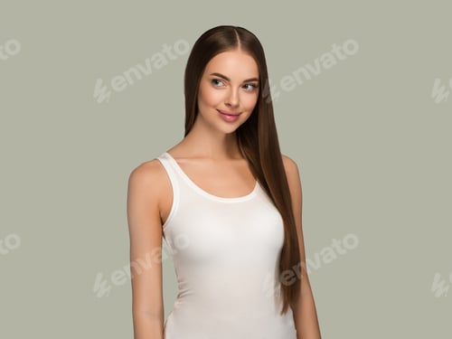 Preview: Beautiful woman with long healthy smooth hair beauty natural casual style. Color background green