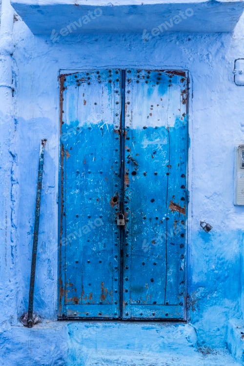 Preview: Ancient blue door of old building