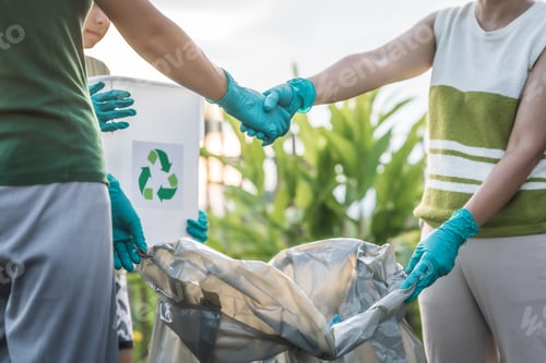 Preview: Women are helping to collect separate garbage, focusing on plastic waste management.sort plastic