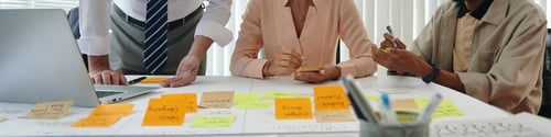 Preview: Colleagues Planning Work At Meeting