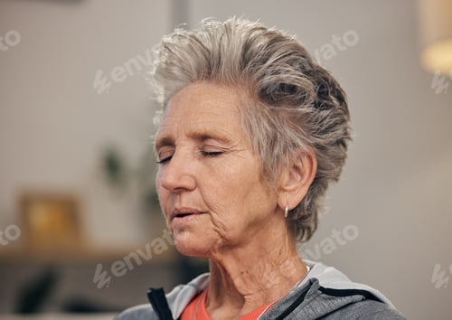 Preview: Senior woman, yoga and breathing in meditation for spiritual wellness or zen, exercise or peace at