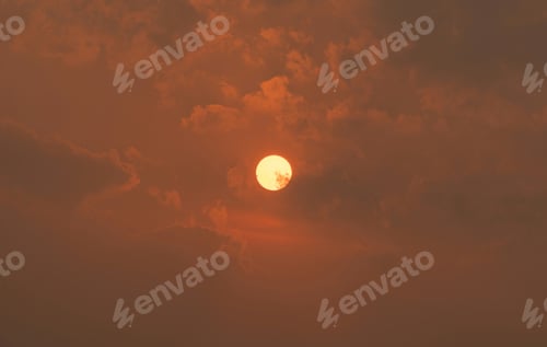 Preview: Sunset sky. Abstract nature background. Dramatic blue and orange, colorful clouds at twilight time.