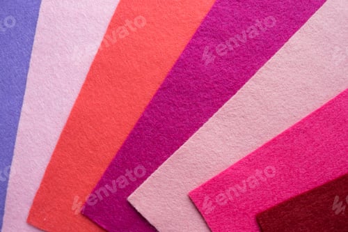 Preview: Fan of colored bright felt textile material. Samples of soft felt flaps in different colours. Felt