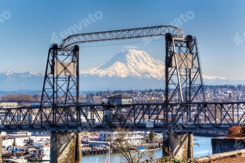 Preview: 55287,Snowy mountain viewed through urban bridge, Tacoma, Washington, United States
