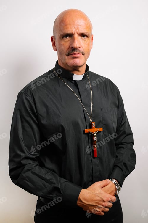 Preview: Portrait of a priest looking at the camera.
