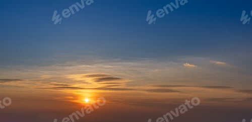 Preview: Minimal sunrise sky with soft haze and warm light creating a calm abstract background.