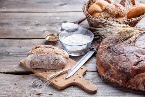 Preview: Delicious fresh bread on wooden background
