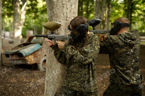Preview: Warriors shooting with paintball guns, team game