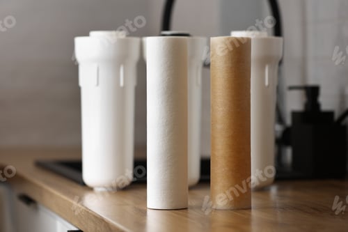 Preview: Water purification for domestic water supply. New clean and used water filter cartridge in rust