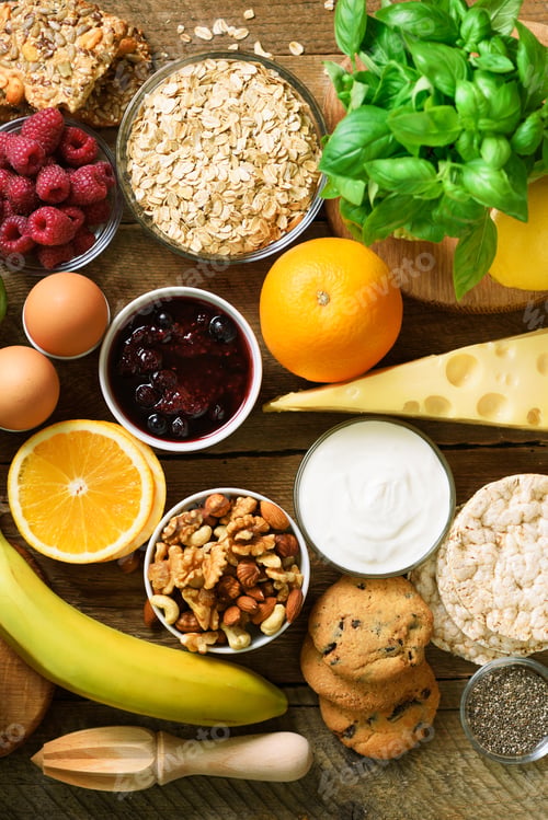 Preview: Healthy breakfast ingredients, food frame. Granola, egg, nuts, fruits, berries, toast, milk, yogurt