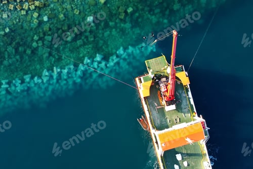 Preview: Drone view of ship in the Adriatic Sea during the construction of dam in the Lustica Bay, Montenegro