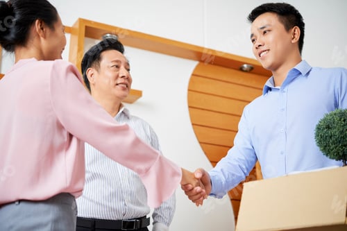 Preview: Business people saying good bye to coworker