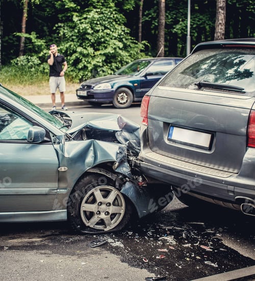 Preview: Close up smached cars on a road.
