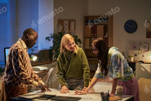 Preview: Multiethnic Young People Collaborating on Project in Office Setting