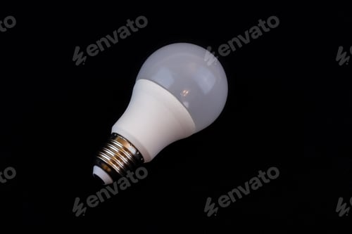 Preview: Energy saving led lamp isolated on a black background