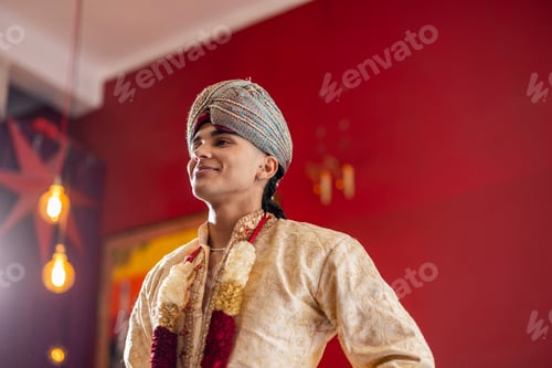 Preview: handsome indian man in traditional clothing and tuban