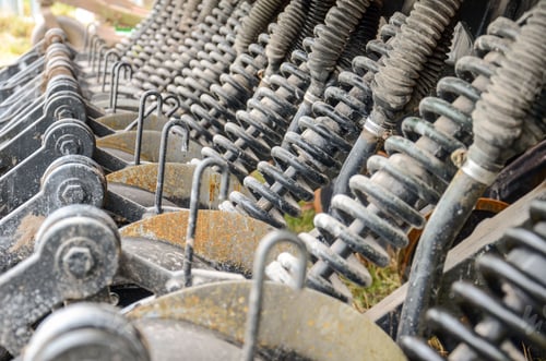 Preview: Closeup of the springs and pistons inside of an agricultural machinery