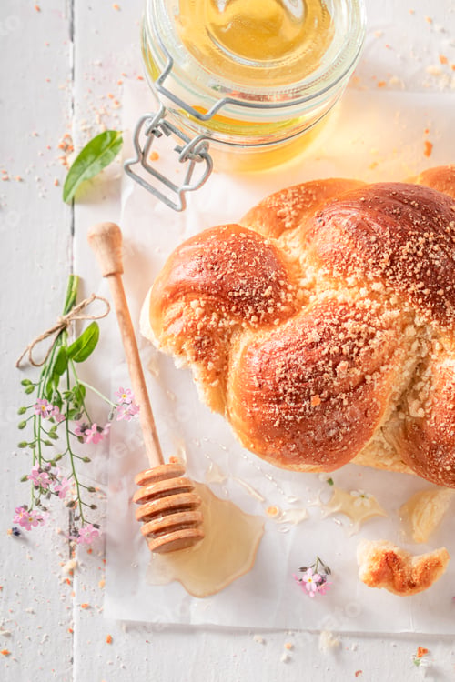 Preview: Hot golden challah with milk and honey.