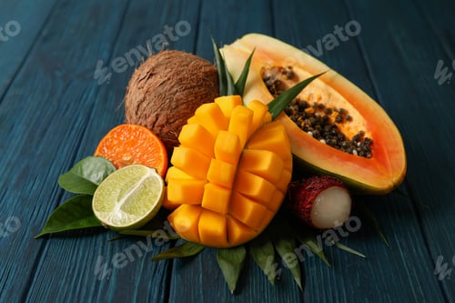 Preview: Fresh ripe exotic fruits on wooden background
