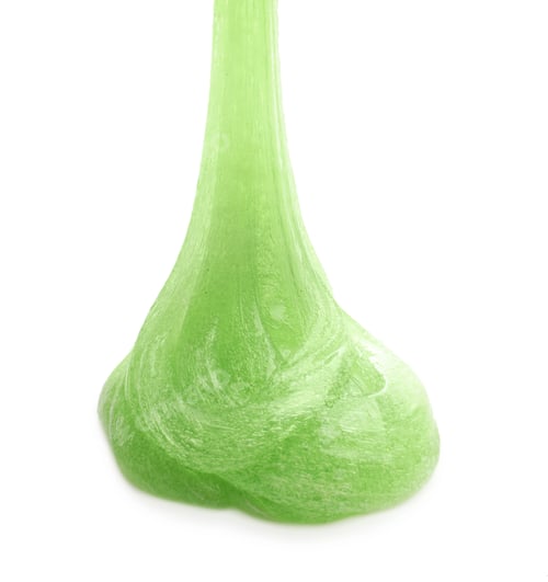 Preview: Flowing green slime isolated on white. Antistress toy