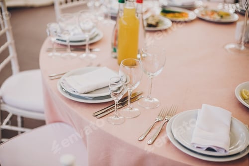 Preview: Wedding setting, tender pink table with glasses, cutlery, napkin and delicious food and drinks