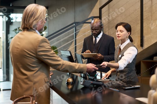 Preview: Conducting Business at Hotel Reception Desk