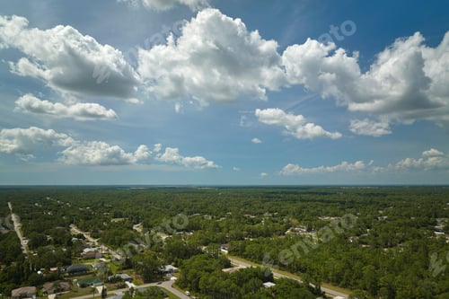 Preview: Aerial view of small town America suburban landscape with private homes