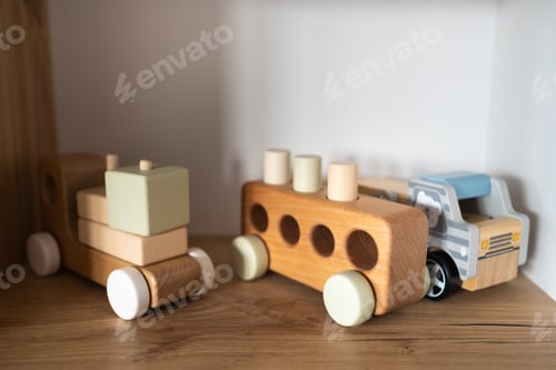 Preview: A shelf with children's wooden toys in the children's room. Children's concept