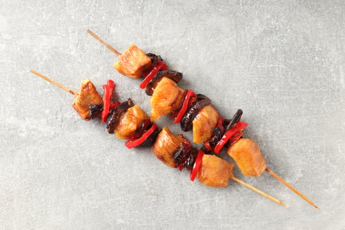 Preview: Tasty chicken shashlik on gray textured background