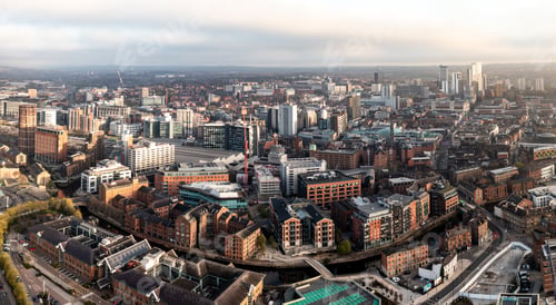 Preview: Aerial panorama of Leeds cityscape skyline with an early morning sunrise