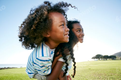Preview: Young mixed race girl giving her younger brother a piggyback lift