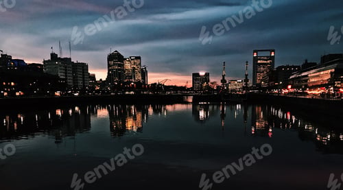 Preview: Cityscape at night with lights reflecting