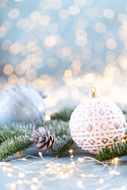 Preview: Christmas spruce with ball and blurred shiny lights.