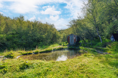Preview: Hot spring pool with wooden hut in the forest