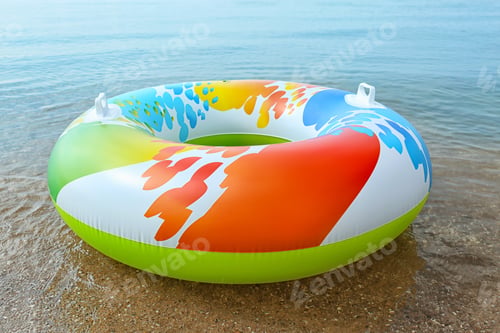 Preview: Bright inflatable ring floating on sea water. Summer vacation