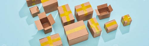 Preview: panoramic shot of postal boxes on blue background with copy space