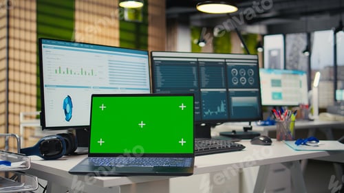 Preview: Empty company office features digital resources and mockup on laptop